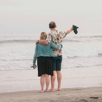 Couple Looking Out to Sea